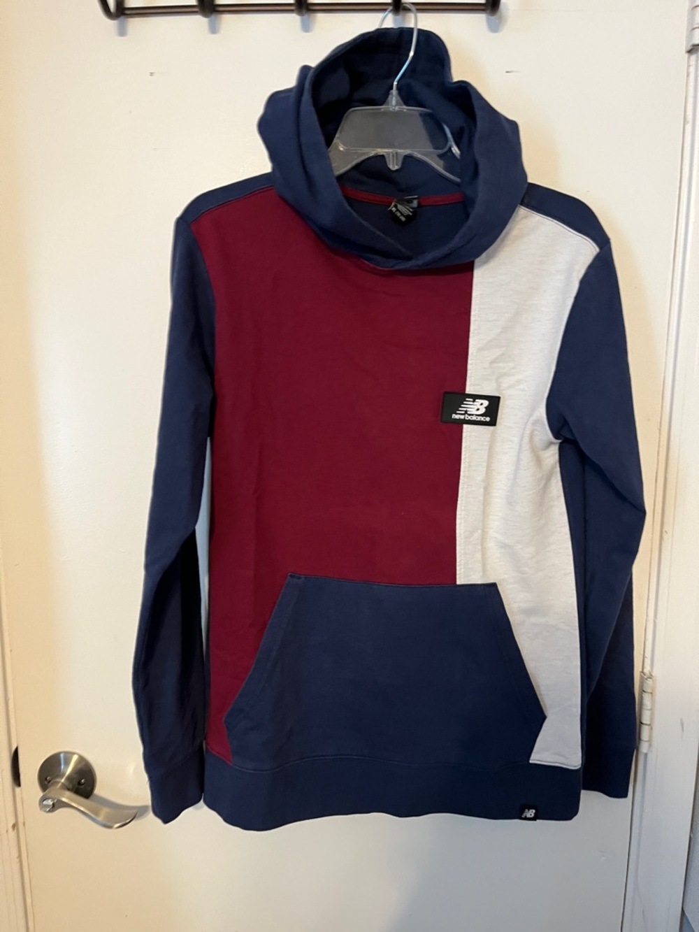 New balance, color block hoodie size 18/20 with Kangaroo pockets.